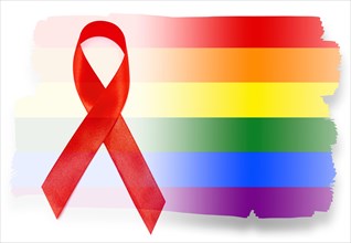 Red Ribbon and Rainbow Flag as Symbols of Hope Freedom - conceptual Picture about situation with Hiv and AIDS between Gay and Lesbian Couples, People