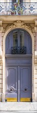 Paris, beautiful wooden door, typical window in the Marais