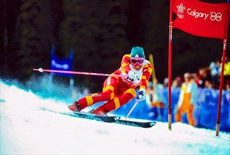 Pirmin Zurbriggen of Switzerland wins the bronze medal in the giant slalom at the 1988 Olympic Winter Games.