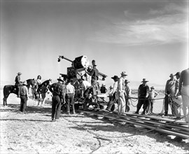 Movie Crew filming GREGORY PECK and JENNIFER JONES on horseback on set location candid during production of DUEL IN THE SUN 1946 directors KING VIDOR OTTO BROWER WILLIAM DIETERLE SIDNEY FRANKLIN WILLI...