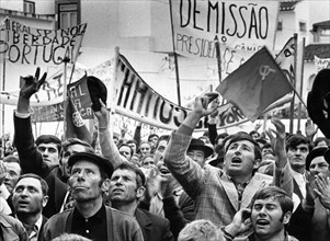Lisbon 1974-05-08 People have gathered in Lisbon, May 08, 1974, carrying posters and flags after a socialist military coup, the so-called Carnation Revolution in Portugal.  Photo: Sven-Erik Sjoberg / ...