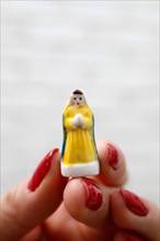 The King Cake a popular food item available beginning January 6, or Epiphany.Sometimes a tiny porcelain figure ( feve ) of a baby, baked with-in the