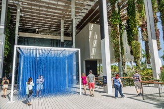 Miami Florida,Museum Park Perez Art Museum Miami,PAMM contemporary artwork outside exterior,Jesus Rafael Soto artist Penetrable BBL Blue installation,
