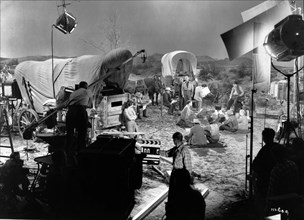 HELENA CARTER and RANDOLPH SCOTT on set candid with Camera / Movie Crew during filming of FORT WORTH 1951 director EDWIN L. MARIN writer John Twist cinematographer Sidney Hickox music David Buttolph W...