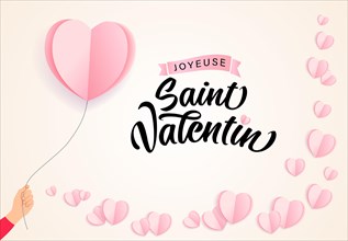 Joyeuse Saint Valentin French lettering - Happy Valentines Day, hand with paper heart balloon. Valentine holiday calligraphy and rose origami hearts