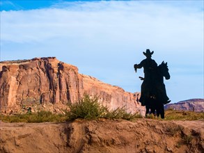cowboy silhouette at John Fords Point in Monument valley