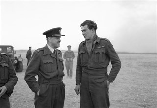 Royal Air Force- 2nd Tactical Air Force, 1943-1945. The Commander-in-Chief of the Allied Expeditionary Air Force, Air Chief Marshal Sir Trafford Leigh-Mallory, chats with Flight-Sergeant T P Fargher a...