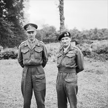 Lieutenant General Miles Dempsey, commanding British 2nd Army, with General Sir Bernard Montgomery in France, 16 July 1944. The Commanding Officers of 21st Army Group: Lt General Miles C Dempsey CB DS...