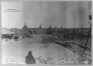 U.S. Army tent camp in Mexico, 1914- row of tents; movie camera at far right