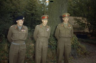Hm King George Vi With the British Liberation Army in Holland, 13 October 1944 HM King George VI with the Commander of the 21st Army Group, Field Marshal Sir Bernard Montgomery (left) and the Commande...