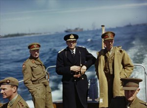 Kiel Harbour, Germany, 19 May 1945 The Commander of the 8th Army Corps, Lieutenant General E H Barker; the Flag Officer in Charge, Kiel Harbour, Rear Admiral H T Baillie-Grohman; and the Commander of ...