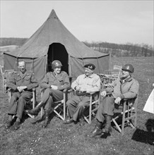 The British Army in North-west Europe 1944-45 Allied commanders conference, 11 April 1945. Lt Gen Sir Miles Dempsey (GOC 2nd British Army); General Omar Bradley (C-in-C 12th Army Group); Field Marshal...