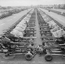 Preparations For Operation Overlord (the Normandy Landings)- D-day 6 June 1944 40mm Bofors Light AA guns on Mark II mountings lined up at an Ordnance Depot at Bicester.