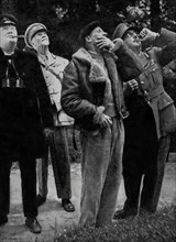 Winston Churchill, General Smuts, General Montgomery and Field Marshal Sir A Brook watch an air battle over the Cherbourg Peninsula. They visited a couple of weeks after D-day on the 6th June 1944, du...