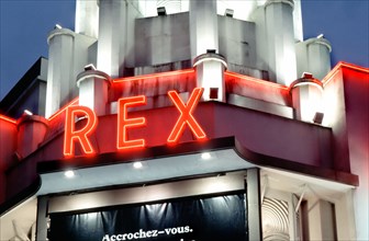 Paris France, exterior, Rex Movie Theater, Art Deco Architecture Front Marquee, lit up at Night Detail neon Light Vintage 1930's Sign, old cinema