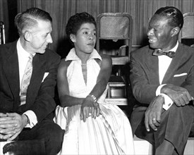 SARAH VAUGHAN - US singer flanked by Stan Kenton at left and Nat King Cole