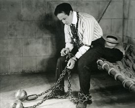 HARRY HOUDINI (1874-1926) Hungarian-American escapologist and magician