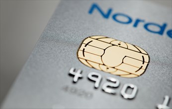 Detail of a icc chip card credit card issued by Nordea bank.