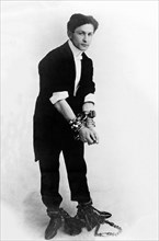 Escapologist Harry Houdini (born Erik Weisz) in chains, c. 1905