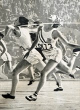 Photograph of Mildred Ella "Babe" Didrikson Zaharias (1911 - 1956)  winning the 80m Hurdles at the 1932 Olympic games. Babe gained world fame in track and field and All-American status in basketball.