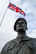 Close up of the statue of Philippe Kieffer beside the 4 Commando and Keiffer Flame Monument at Sword beach, Ouistreham, Normandy, France.