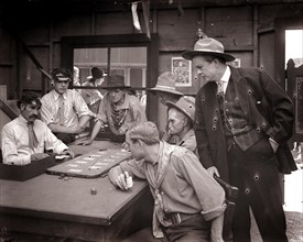 1890s 1900s 1910s FARO CARD GAME MEN PLAYING GAMBLING IN OLD WILD WEST SALOON silent movie still uncorrected glass plate - asph106 ASP001 HARS WILD WEST LIFESTYLE ACTOR HISTORY STUDIO SHOT COPY SPACE ...