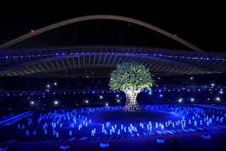 Athens, Greece 17SEP04: Colorful lights illuminate Olympic Stadium during the artistic portion of the opening ceremonies of the Athens Paralympics. ©Bob Daemmrich