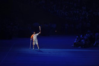 Beijing, China  September 6, 2008: Handicapped Paralympic torch-bearer at the Opening Ceremonies of the Beijing Paralympics at China's National Stadium, known as the Bird's Nest.      ©Bob Daemmrich