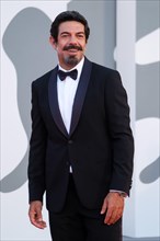 Palazzo del Cinema , Lido, Venice, Italy. 12 September 2020.  Pierfrancesco Favino poses on the red carpet for the Closing Ceremony and Finale. . Picture by Julie Edwards./Alamy Live News