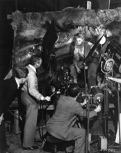 ROBERT DONAT on set candid with Movie Crew during filming of THE COUNT OF MONTE CRISTO 1934 director ROWLAND V. LEE novel Alexandre Dumas screenplay Philip Dunne Dan Totheroh  and Rowland V. Lee cinem...