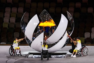 Tokyo, Japan. 2021 August 25th. Opening ceremony of the Paralympic Games Tokyo 2020. torch lighting with paralympic fire. Credit: Marco Ciccolella/Alamy Live News