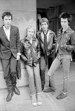 Sex Pistols punk rock band seen here in a London  Circa 1st May 1977
Left is Johnny Rotten - singer 
2nd left is Paul Cook - drums
3rd from left is Steve Jones - electric guitar 
Far right is Sid Vici...