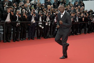Cannes, France. 18th May, 2022. 75th Cannes film festival 2022, Red carpet 'TopGun - Maverick' . Pictured: Omar Sy Credit: Independent Photo Agency/Alamy Live News