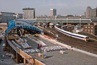 A Network SouthEast Class 442 Wessex electric departs London Waterloo and passes the ongoing construction work for the four new platforms to accommodate the soon to be introduced Eurostar trains. Once...