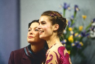 Katarina Witt (GDR) with her coach, Jutta Muller, Gold medalist in Figure Skating Ladies' singles at the 1984 Olympic Winter Games.
