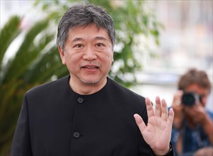 230518 -- CANNES, May 18, 2023 -- Japanese director Kore-Eda Hirokazu poses during a photocall for the film Kaibutsu Monster which will compete for the Palme d Or during the 76th edition of the Cannes...