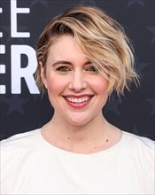 SANTA MONICA, LOS ANGELES, CALIFORNIA, USA - JANUARY 14: Greta Gerwig wearing a Molly Goddard dress, Tabayer jewelry and Jimmy Choo shoes arrives at the 29th Annual Critics' Choice Awards held at The ...