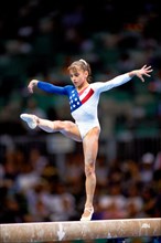 Dominique Moceanu (USA) competing at the 1996 Olympic Summer Games.