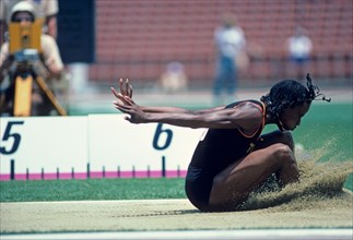Jackie Joyner Kersee (USA) competing in the long jump during the 1984 Olympic Team Track and Field Trials, Los Angeles, CA.