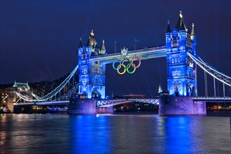 A light show on Tower Bridge with Olympic Rings  precedes a firework display at the commencement of the Olympic Games 2012