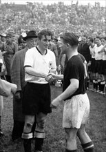 (FILE) - Hungarian team captain Fernenc Puskas (R) congratulates German team captain Fritz Walter (C) after the World Cup 1954 finals in Bern, Switzerland, 04 July 1954. Soccer legend Puskas died on F...
