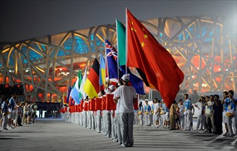 The flags of all participating nations of the 2008 Olympic Games are carried into the National Stadium at the rehearsal of the opening ceremony in Beijing, China, 30 July 2008. The Beijing 2008 Summer...