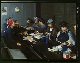 Women workers employed as wipers in the roundhouse having lunch in their rest room, C. & N.W. R.R., Clinton, Iowa (LOC)