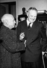Artist Pablo Picasso at the he Matarasso Gallery with politician Maurice Thorez