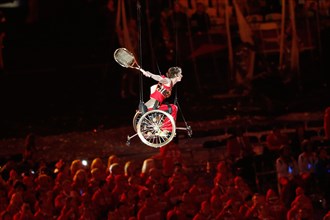 Artists perform in the Olympic Stadium during the opening ceremony of the London 2012 Paralympic Games, London, Britain, 29 August 2012.