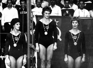 Russian gymnasts on podium at the 1960 Olympic Games