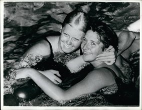Aug. 08, 1960 - Olympic Games In Rome. Dawn Fraser Equals World Record. Photo shows Australian swimmer Dawn Fraser is congratulated by C. Von Saltza (U.S.A.), after equalling the world record when win...