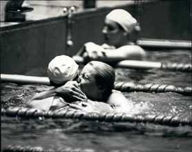 1964 - Swimming Galina Prozumenschikova of USSR, gives a big kiss and hug to one of her competitors after, winning the Gold Medal, in the Women's 200 Metres Breast stroke and setting a new Olympic rec...