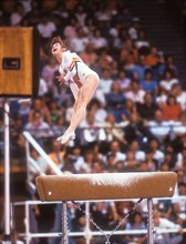 Ecaterina Szabo from Romania performs on women's vault during competition at 1984 Olympic Games in Los Angeles.