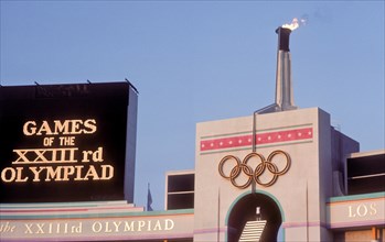 Rafer Johnson brings Olympic torch to light flame during opening ceremonies at 1984 Olympic Games in Los Angeles.